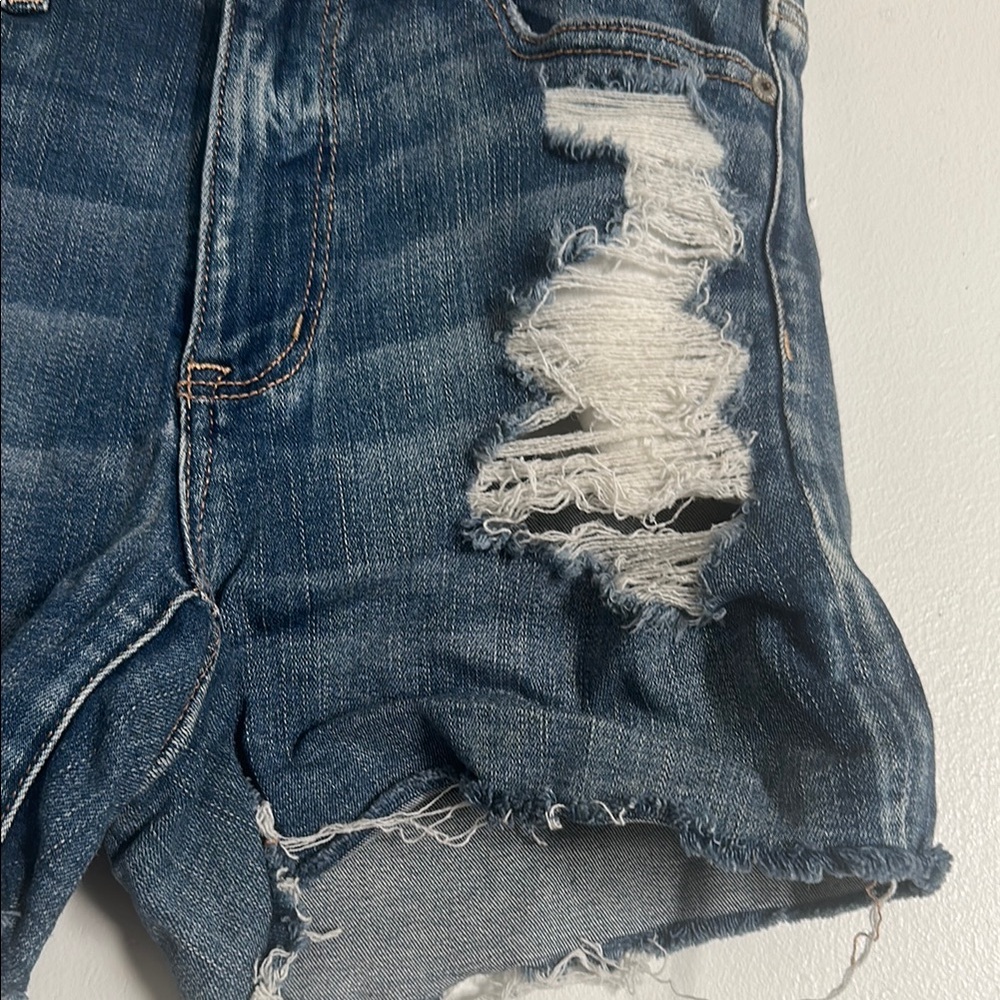 EUC American Eagle Next Level Stretch Blue Distressed Jean Shorts with Raw Hem - Picture 4 of 5